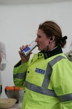 Policewoman Drinking Can Of Red Bull A8V3051