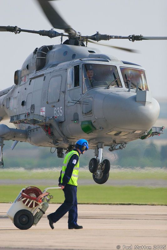 Royal Navy Lynx Landing With Man In Foreground IMG 9104