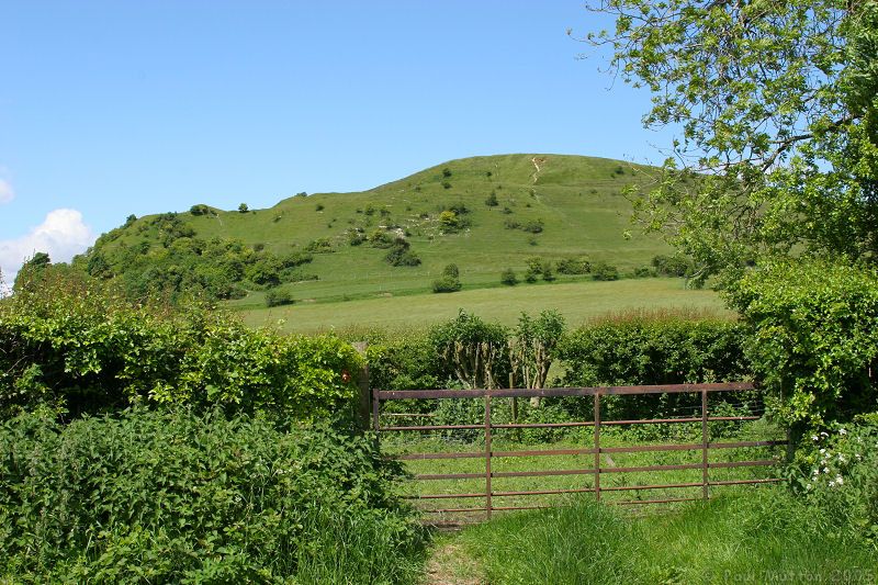 Cley Hill and fence with blue sky