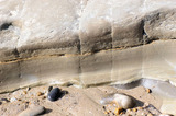 Weathered Rock On Beach Sand And Pebbles IMG 2999